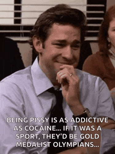a man in a suit and tie is laughing with a caption that says " being pissy is as addictive as cocaine "