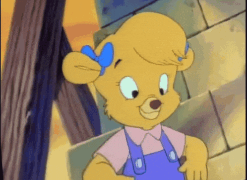 a cartoon character with overalls and a bow on her head