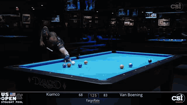 a pool table with a blue cloth that says diamond