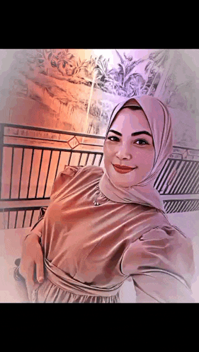 a woman wearing a hijab and a dress is standing in front of a railing .