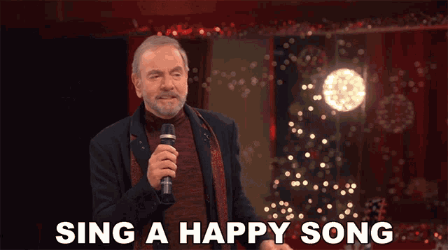 Sing A Happy Song Neil Diamond GIF - Sing A Happy Song Neil Diamond Christmas Medley Song GIFs