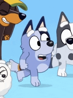 a group of cartoon dogs are standing next to each other on a blue background .