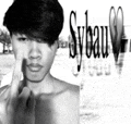 a black and white photo of a shirtless man giving the middle finger