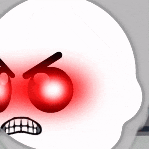 a white cartoon face with red eyes and a toothy mouth