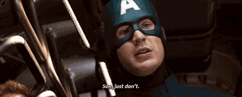 captain america is talking to a man in a mask .