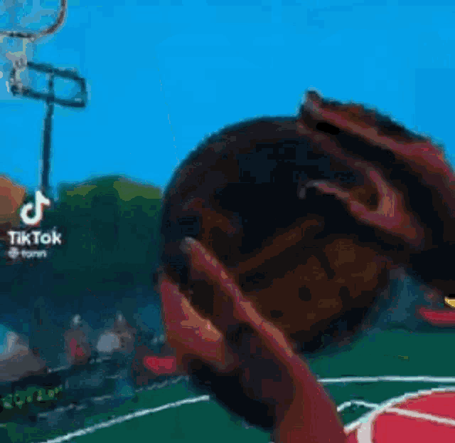 a basketball game is being played with a scoreboard that has the number 00 on it