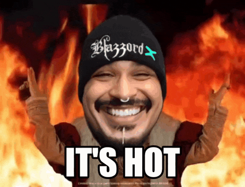 a man wearing a black beanie that says blazzard on it