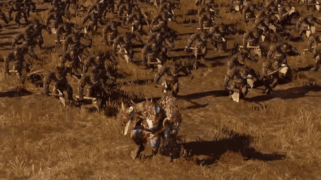 a large group of soldiers are fighting in a field