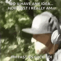 a man wearing a white hat is talking on a cell phone .