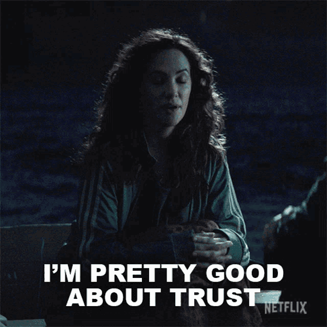a netflix advertisement shows a woman sitting on a beach and says i 'm pretty good about trust
