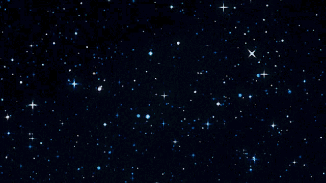 a black background with a lot of stars and a green star in the middle