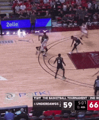 a basketball game is being played in a stadium and the score is 59 to 66