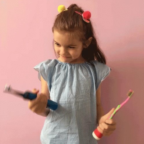 Girl In Gray Dress Toothbrush GIF - Girl In Gray Dress Toothbrush Smiling GIFs
