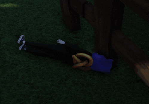 a person laying on their back with a blue hat on