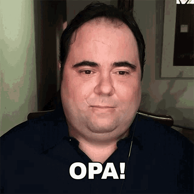 a man with the word opa written in white