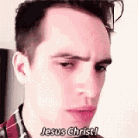 a close up of a man 's face with the words `` jesus christ ! '' written on it .