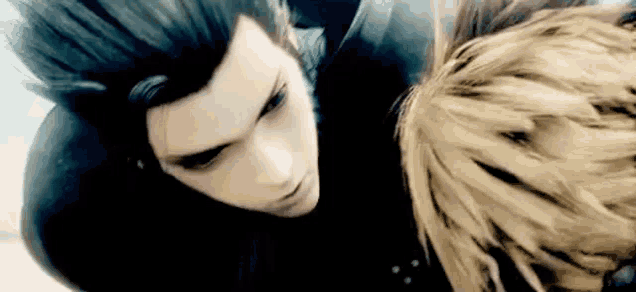 a close up of a man and a woman looking at each other in a video game .