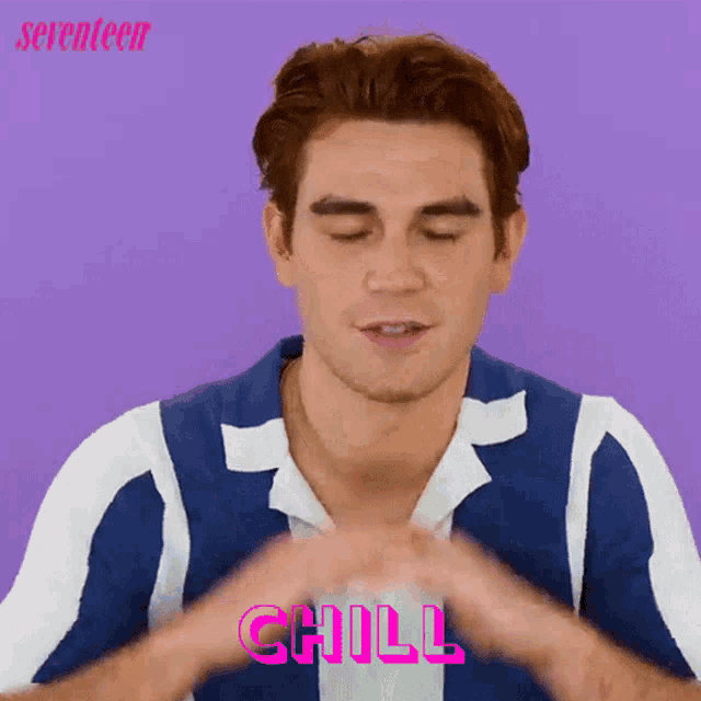 a man in a blue and white striped shirt is making a heart shape with his hands and the word chill is behind him