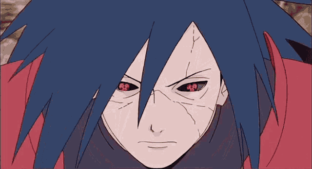 a close up of a person 's face with red eyes