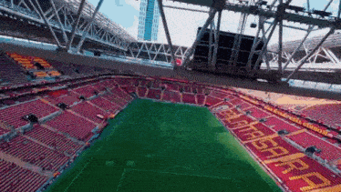 a soccer stadium with the word galatasaray on the side