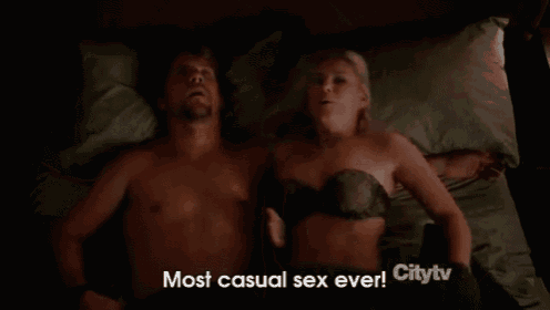 a man and a woman laying on a bed with the words most casual sex ever