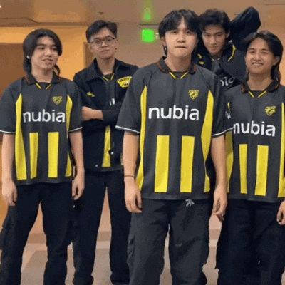 a group of young men wearing black and yellow striped shirts that say nubia