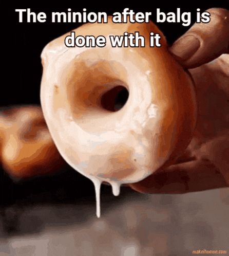a person is holding a doughnut with icing dripping out of it and the caption the minion after balg is done with it