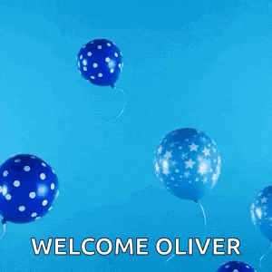 a bunch of blue balloons with the words yay welcome oliver written on them .