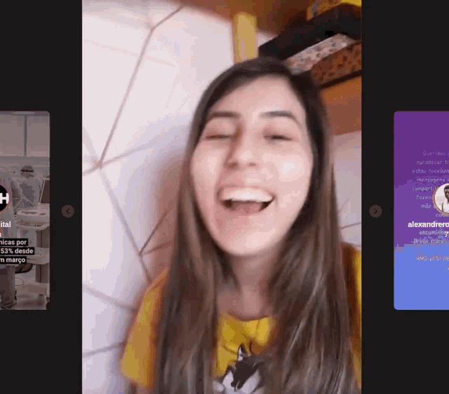 a woman is laughing in front of a screen that says alexandre