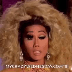 a close up of a woman 's face with the words " my crazy wednesday.com " written below her