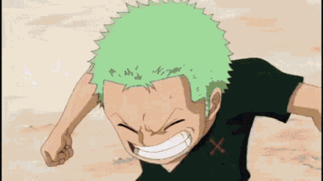 a young boy with green hair is wearing a black shirt with an x on the sleeve .