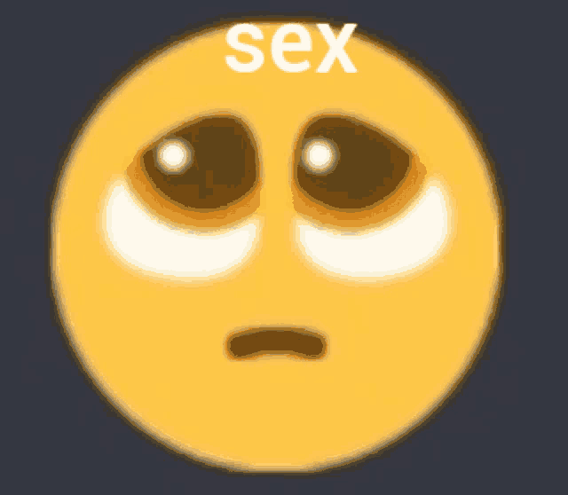 a cube with a smiley face and the word sex on top