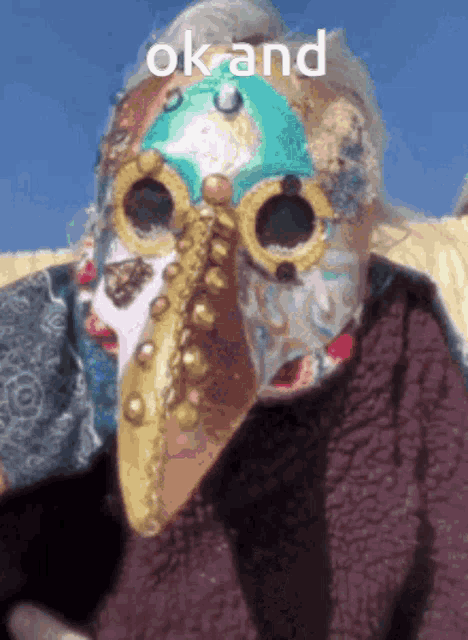 a person wearing a mask with the words ok and written on it
