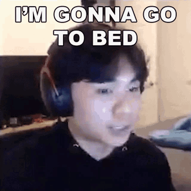 a man wearing headphones says `` i 'm gonna go to bed ''