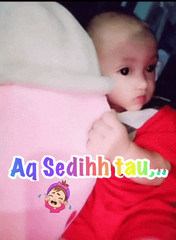 a picture of a baby with the words aq sedih tau written on it
