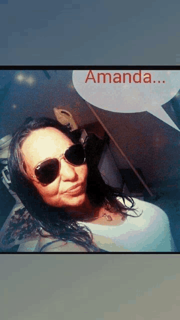 a woman wearing sunglasses and a speech bubble that says amanda on it