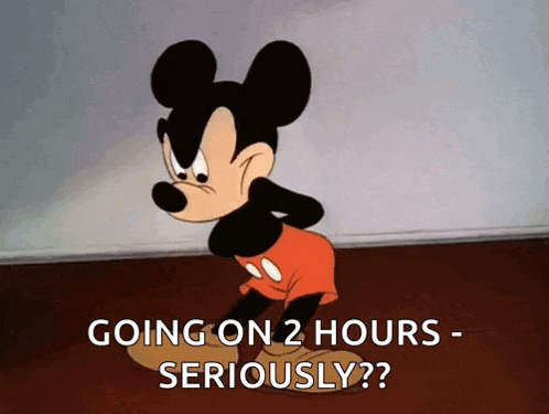 a cartoon of mickey mouse with the words " going on 2 hours seriously "