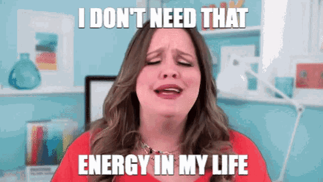 a woman in a red shirt is making a funny face with the caption i don t need that energy in my life