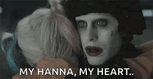 the joker is hugging harley quinn in the suicide squad movie .