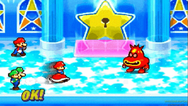 mario and luigi are fighting a red monster in a video game that says ok on the bottom
