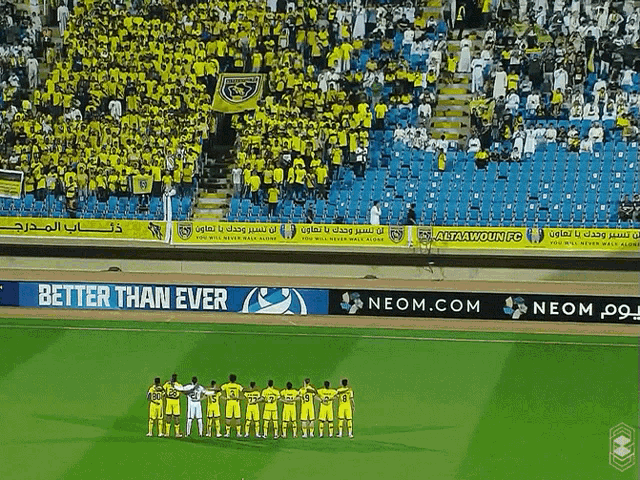 a group of soccer players stand in front of a banner that says " better than ever "