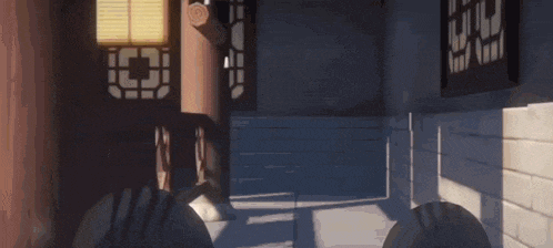 a cartoon character is laying down in a room with a lantern in the background