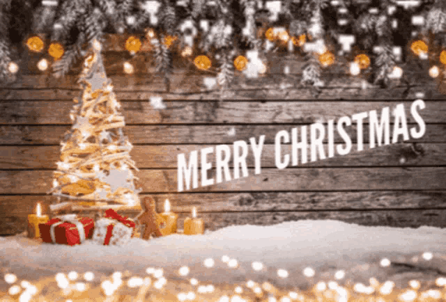 a merry christmas sign with a christmas tree