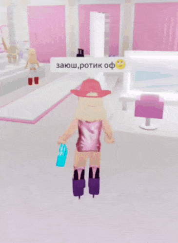 a girl in a cowboy hat is holding a blue bag in a room with a smiley face in the corner