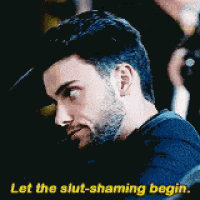 a man with a beard is talking to another man and says `` let the slut-shaming begin . ''