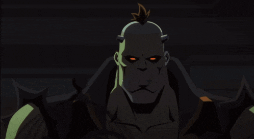 a man in a mask holds a gun in a room