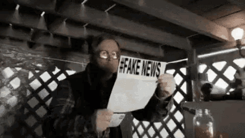 Fake News News GIF - Fake News News Reading GIFs