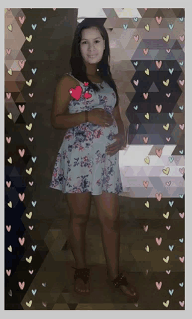 a pregnant woman in a floral dress holds her belly in front of a collage of hearts