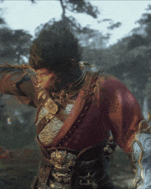 a monkey with a beard is wearing a red and gold costume