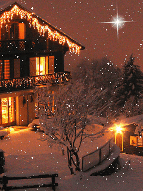 a house with christmas lights on the roof and a star in the sky